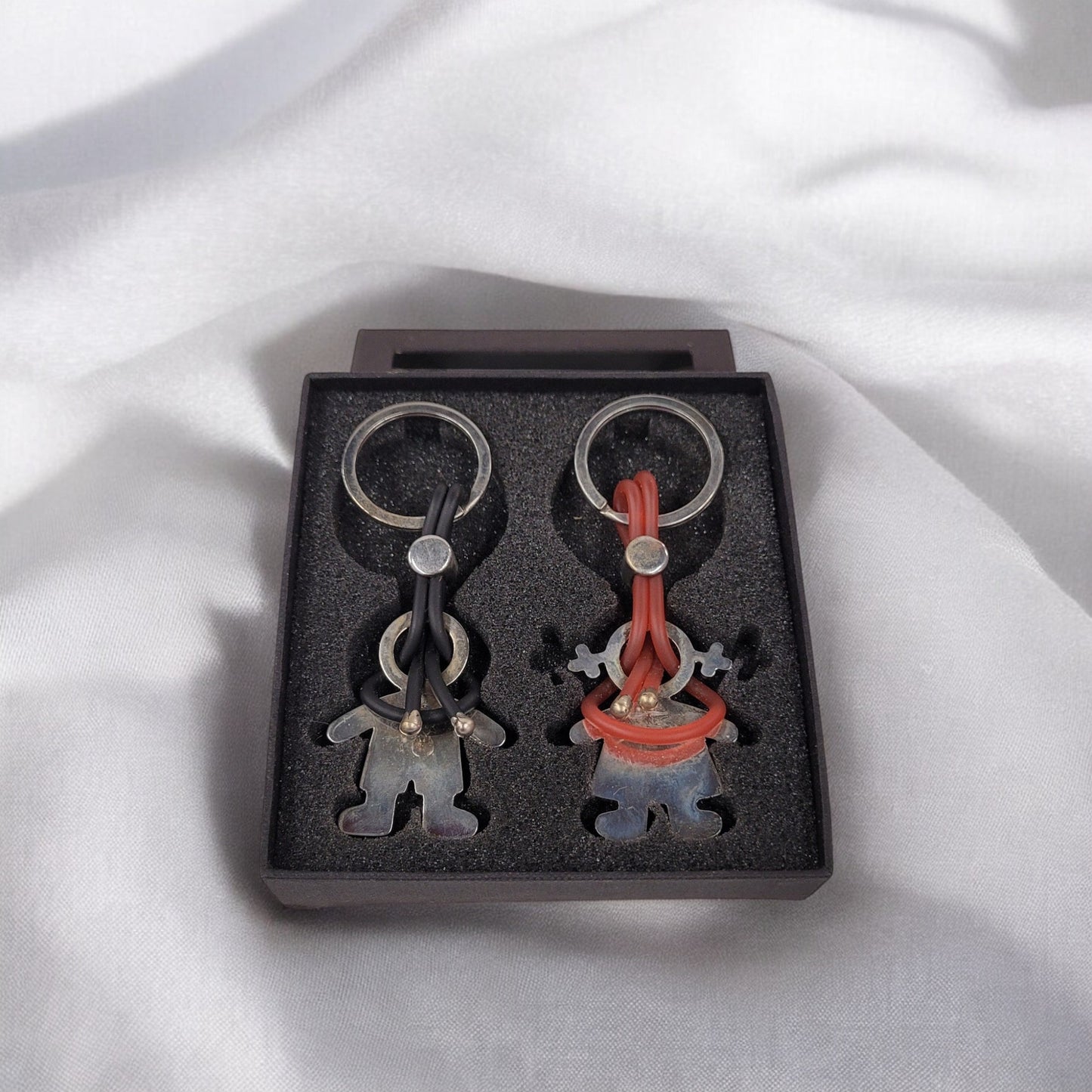 Metal Man And Woman Keychains