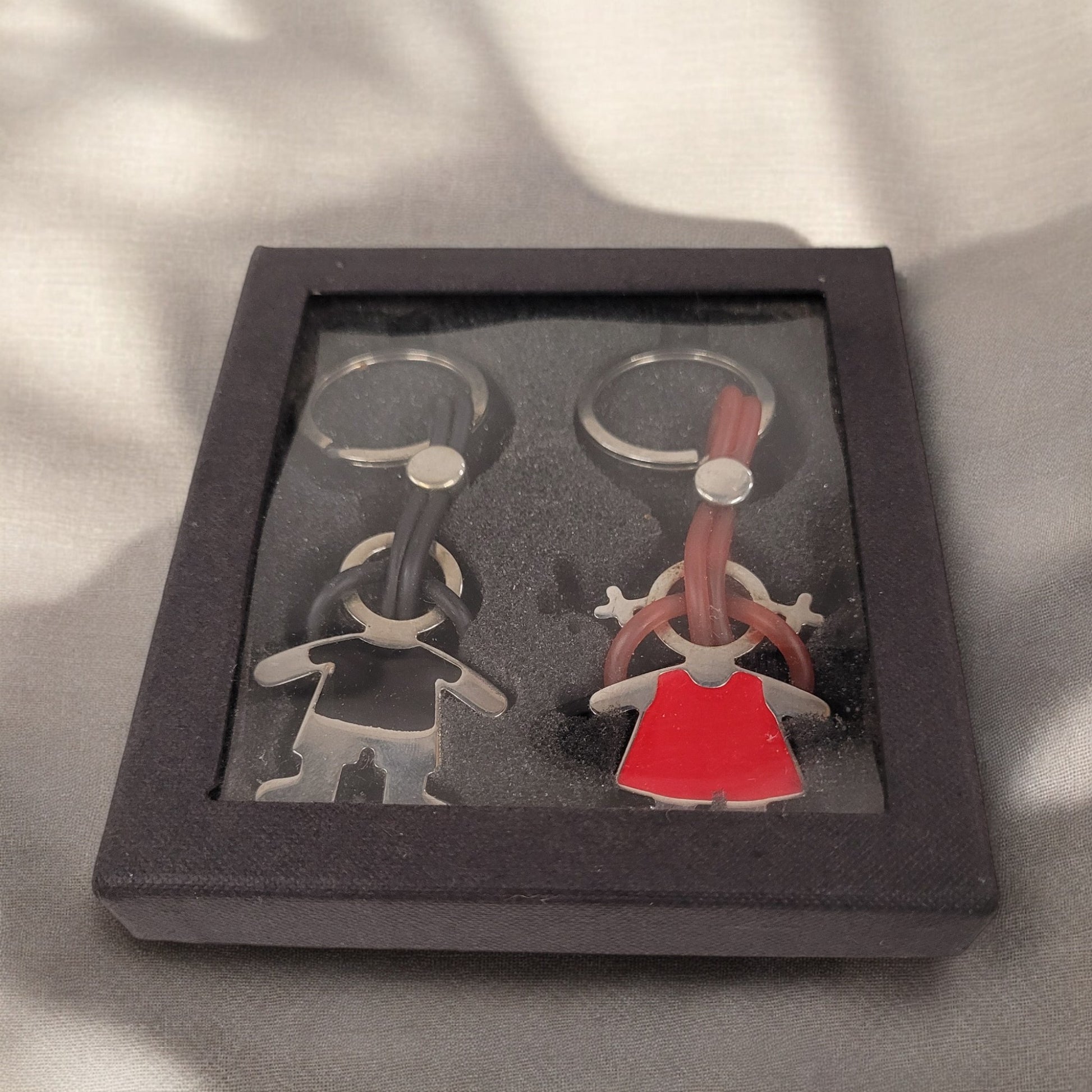 Metal Man And Woman Keychains