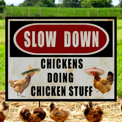 slow down sign chickens doing chicken stuff sign 