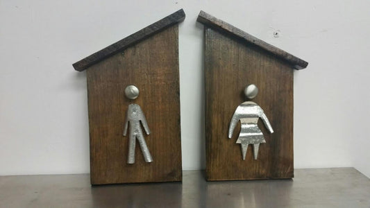 mens and womans bathroom restrooms sign